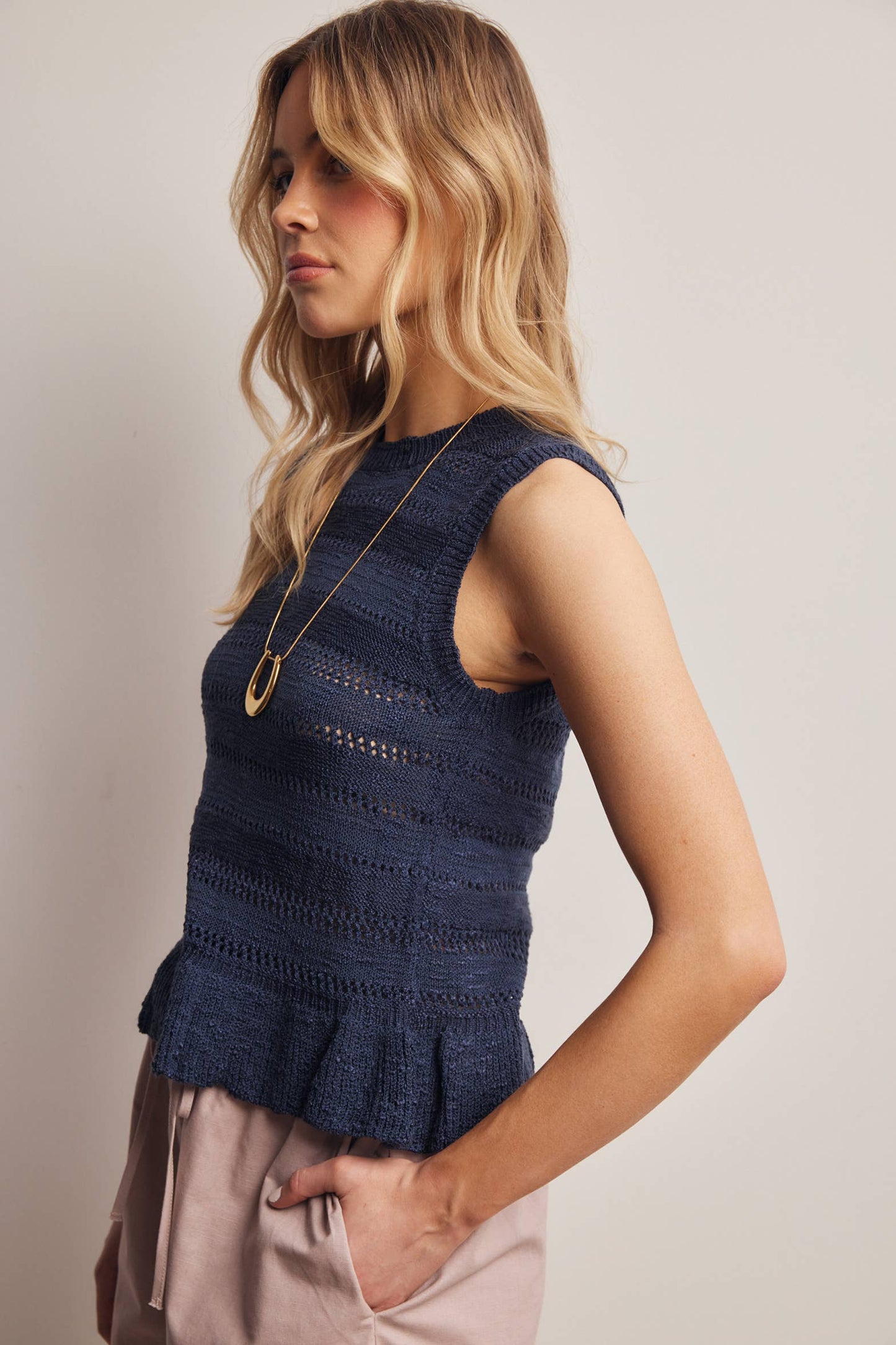 Sleeveless Pointelle Knit Peplum top