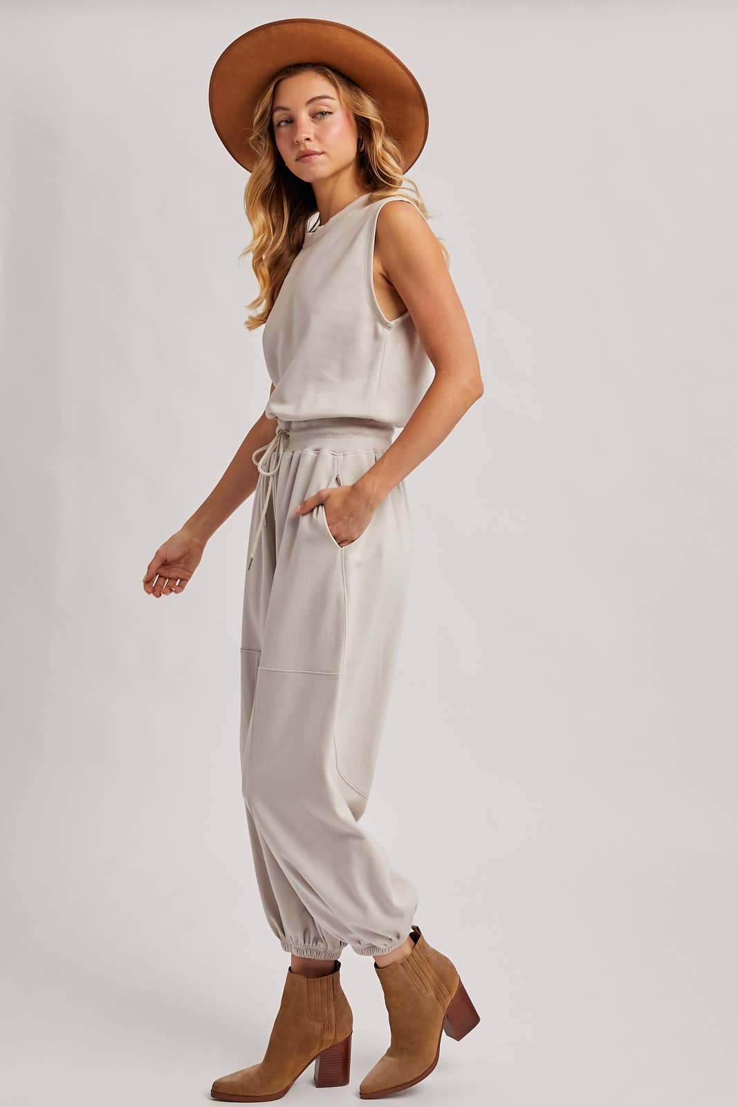 DRAWSTRING WAIST SLEEVELESS KNIT ACTIVE JUMPSUIT in Hunter Green