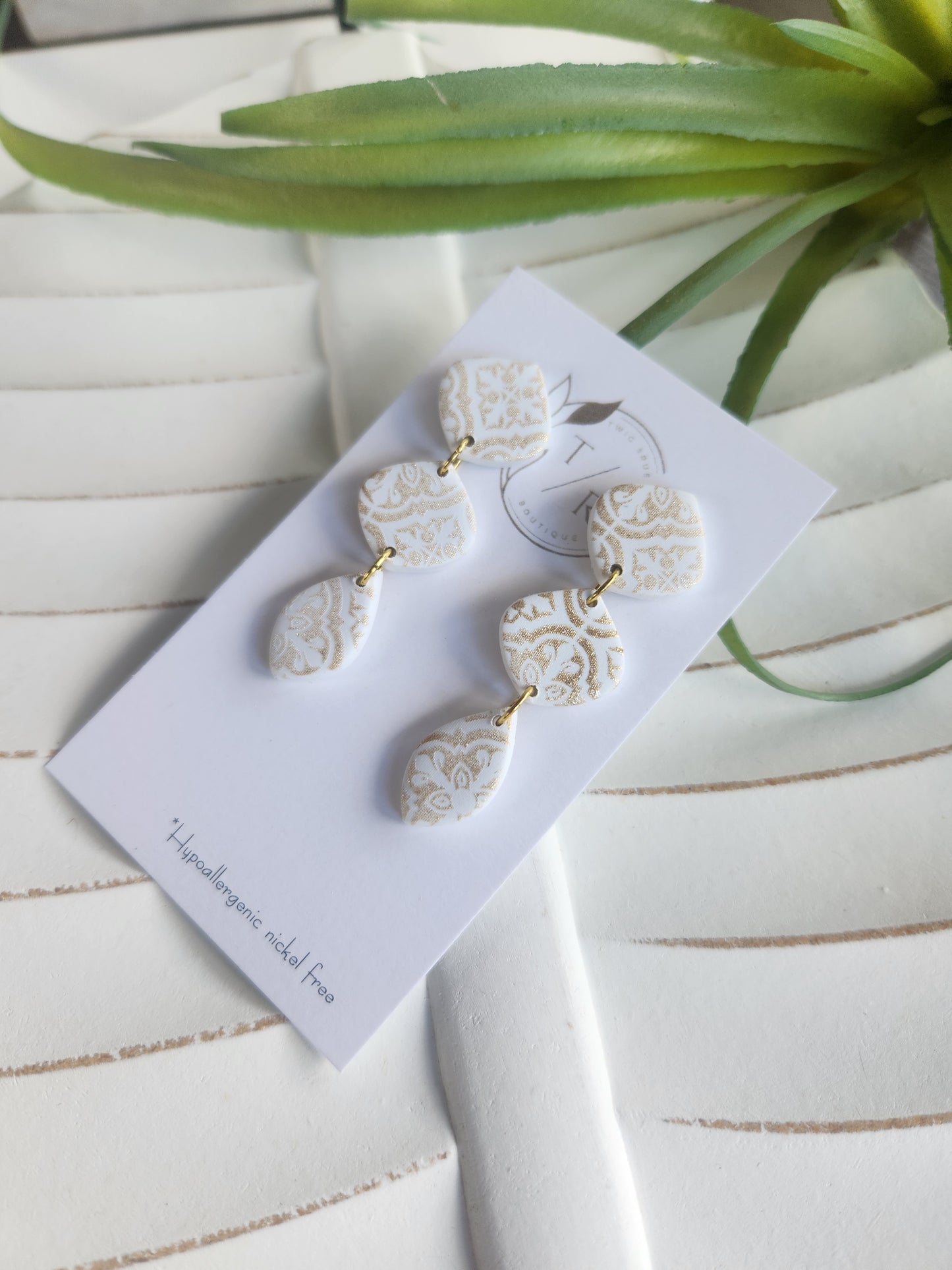 Darya| Antique gold and white clay earrings