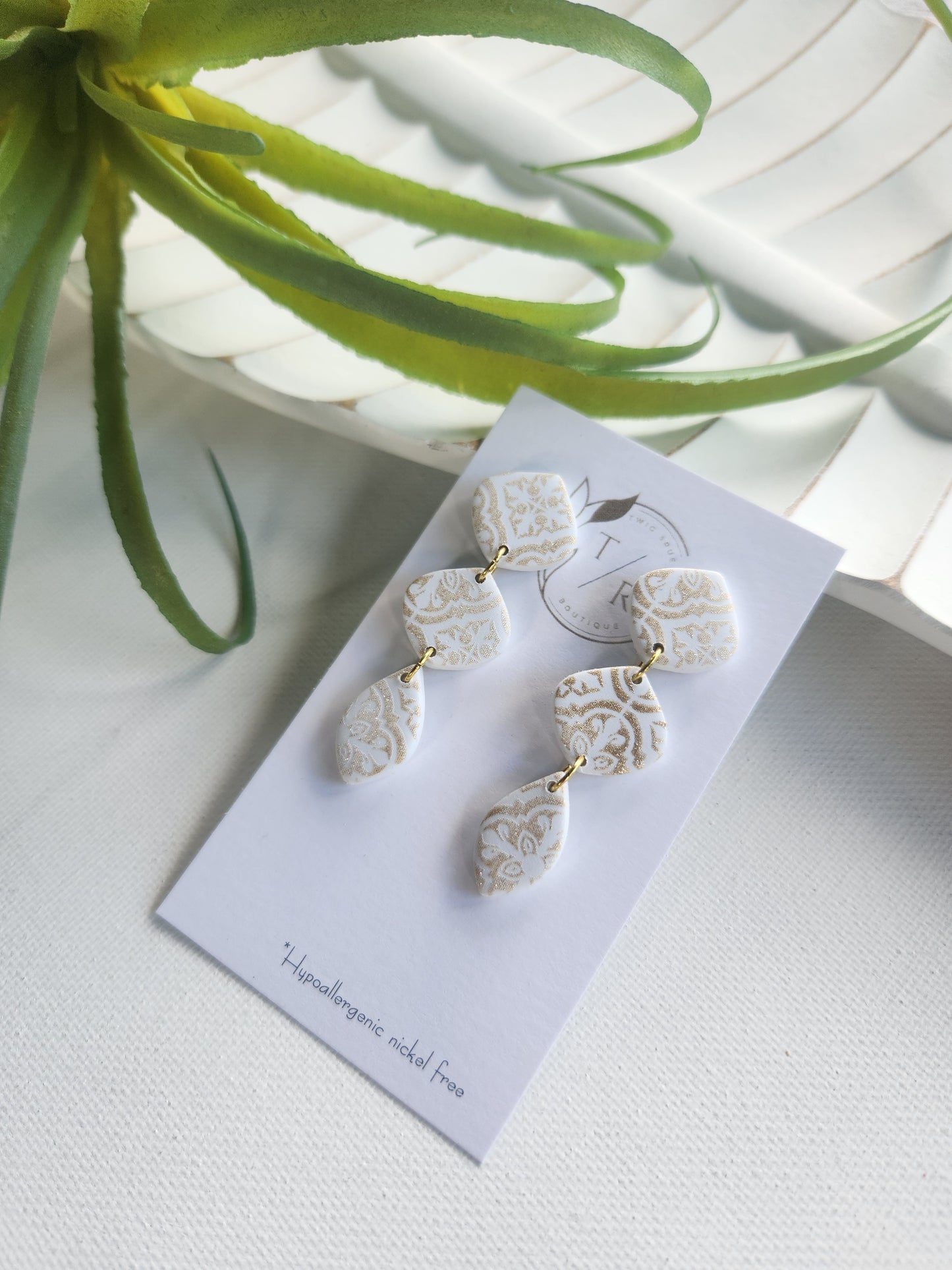 Darya| Antique gold and white clay earrings