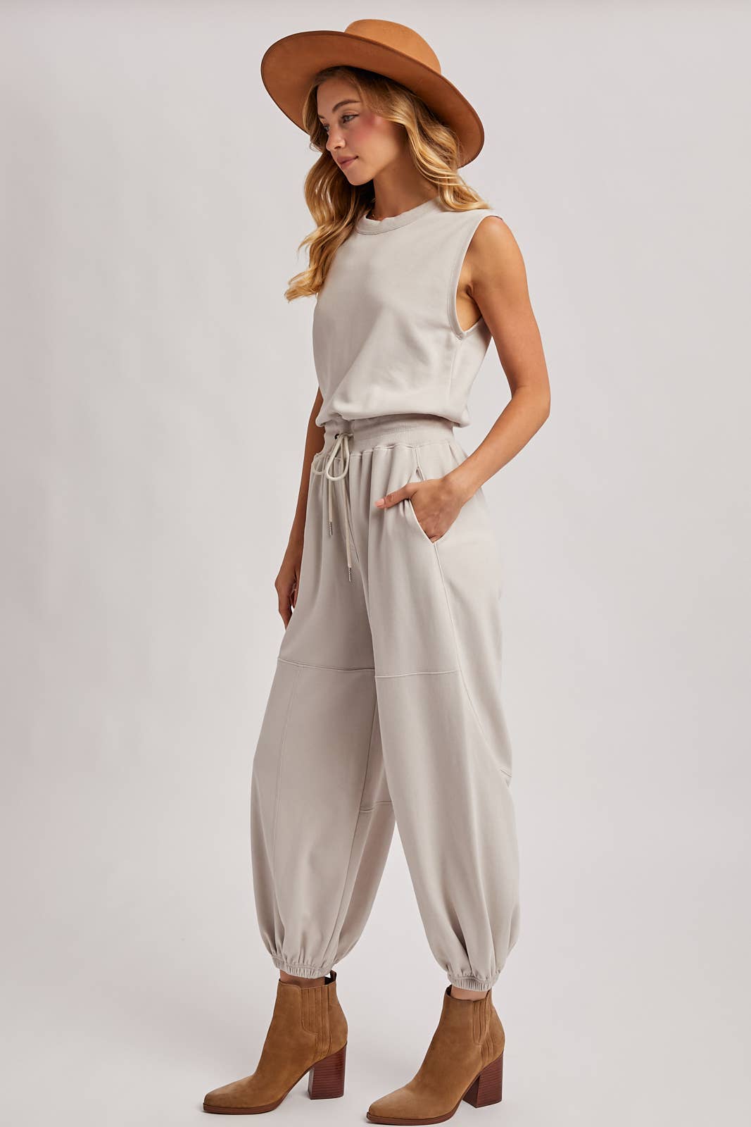 DRAWSTRING WAIST SLEEVELESS KNIT ACTIVE JUMPSUIT in Hunter Green