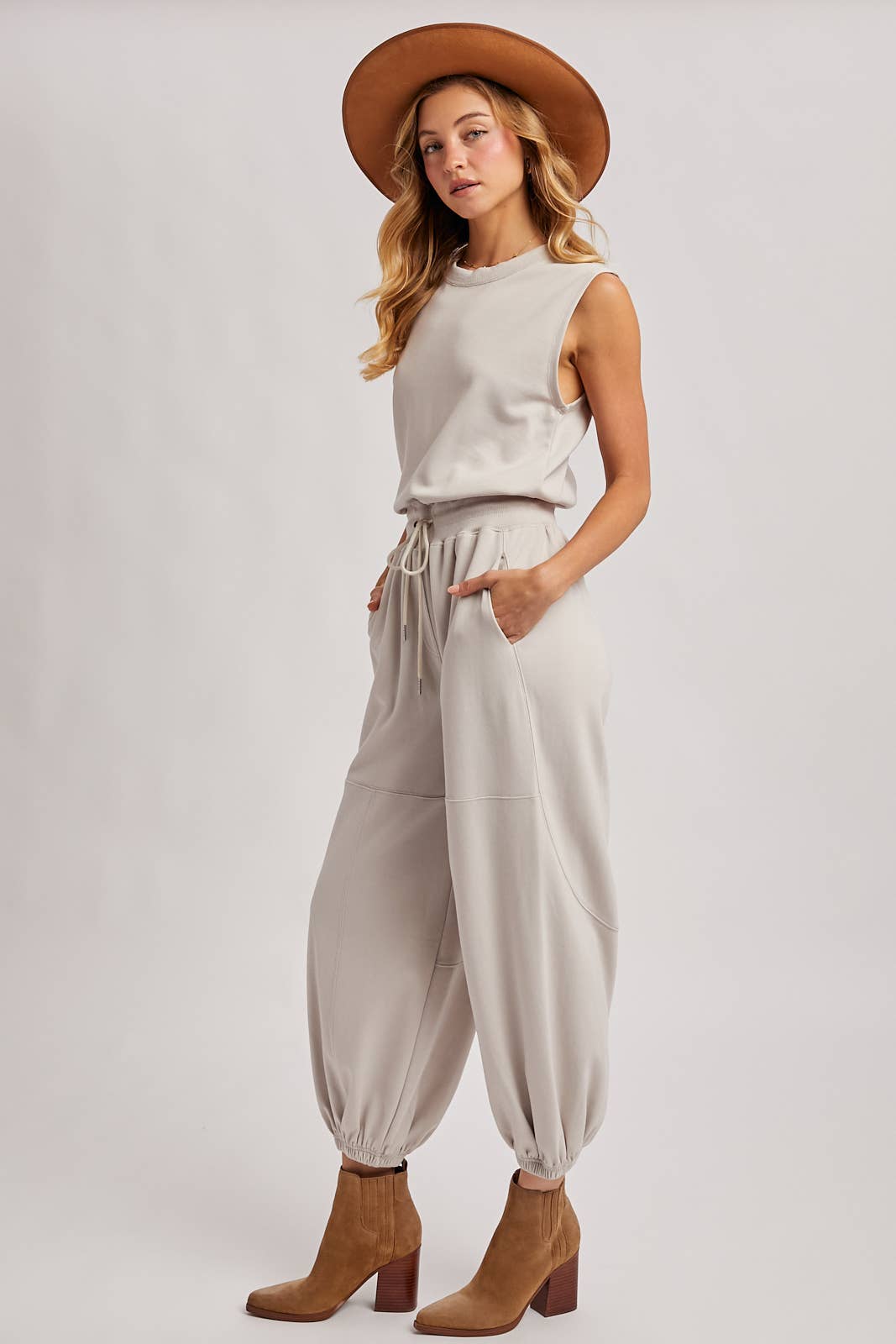 DRAWSTRING WAIST SLEEVELESS KNIT ACTIVE JUMPSUIT in Hunter Green