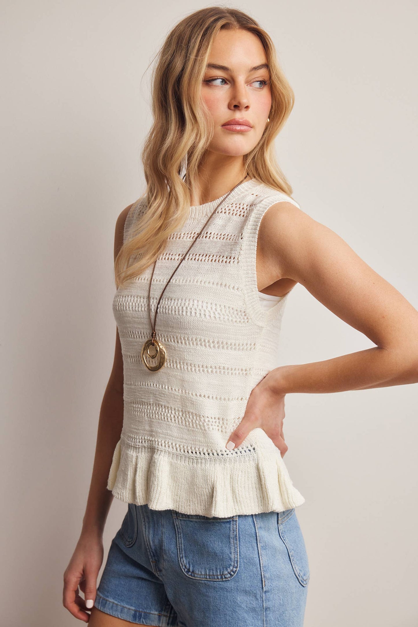 Sleeveless Pointelle Knit Peplum top