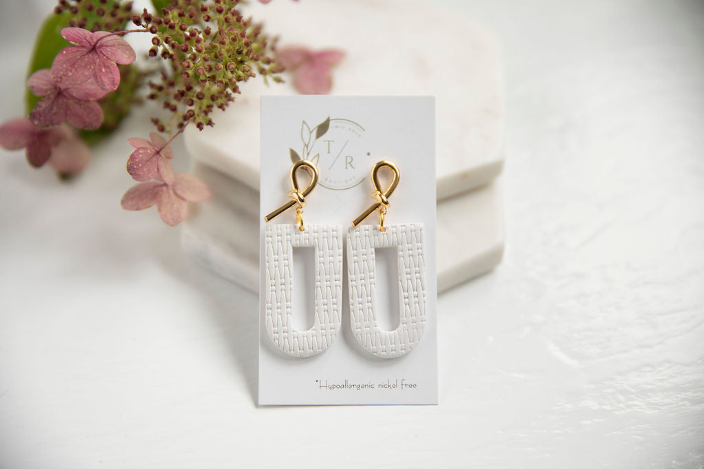 Sierra| 18k gold plated knot and clay arch earring