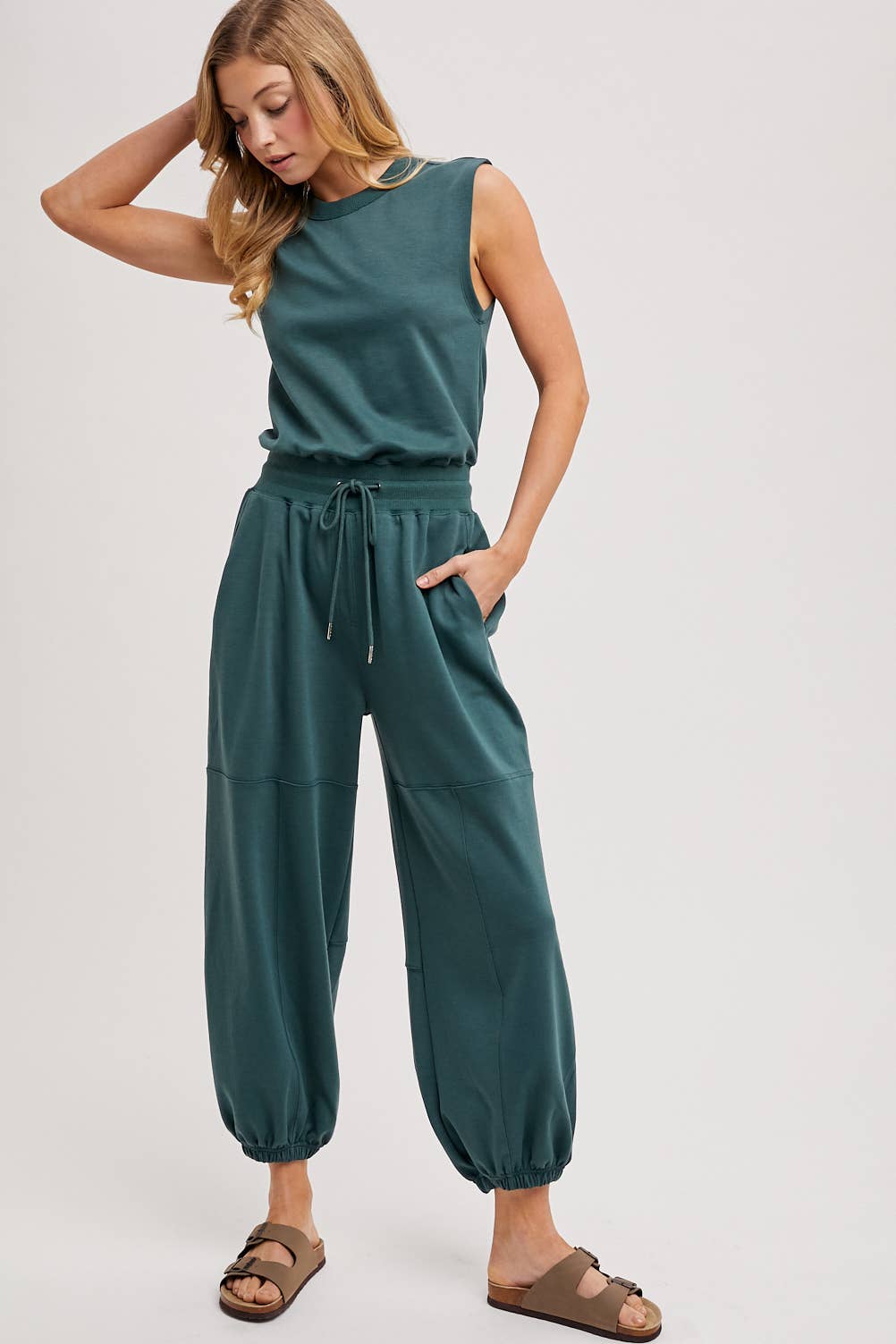 DRAWSTRING WAIST SLEEVELESS KNIT ACTIVE JUMPSUIT in Hunter Green
