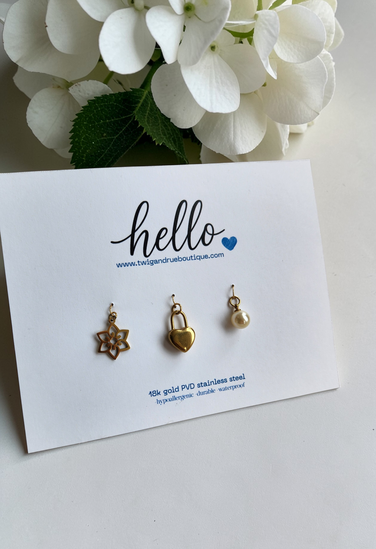 Love in Bloom 18k gold PVD charm collection